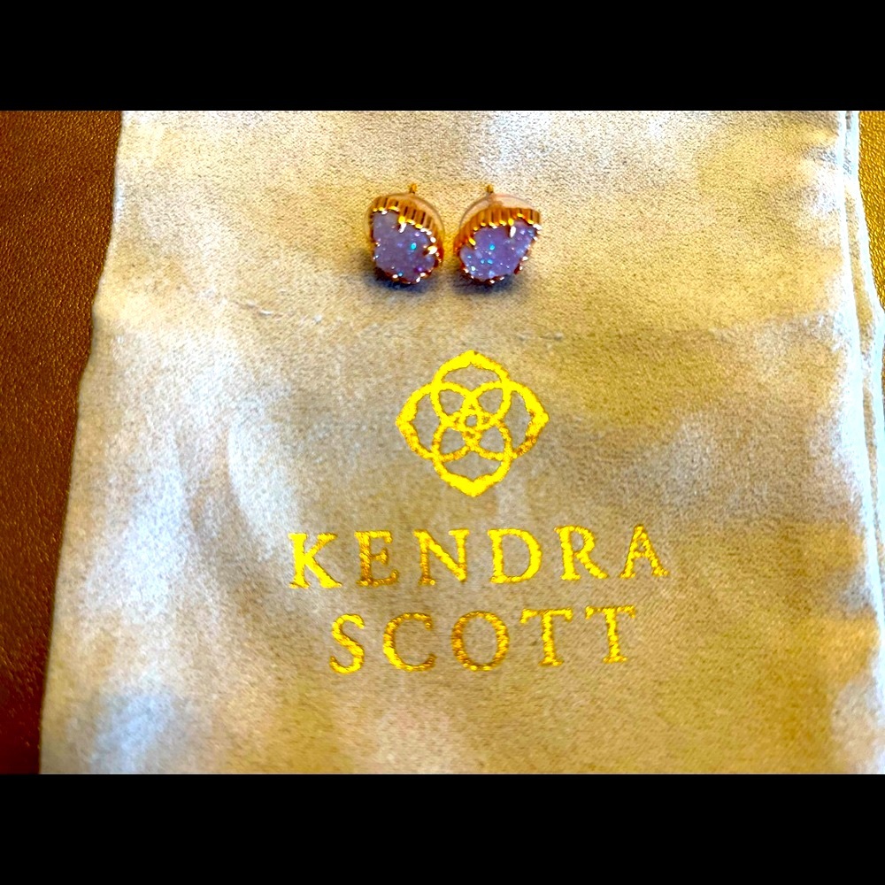 Kendra Scott Drusy Earrings, framed in gold.